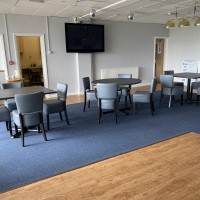 Grey cafe chairs with grey tables